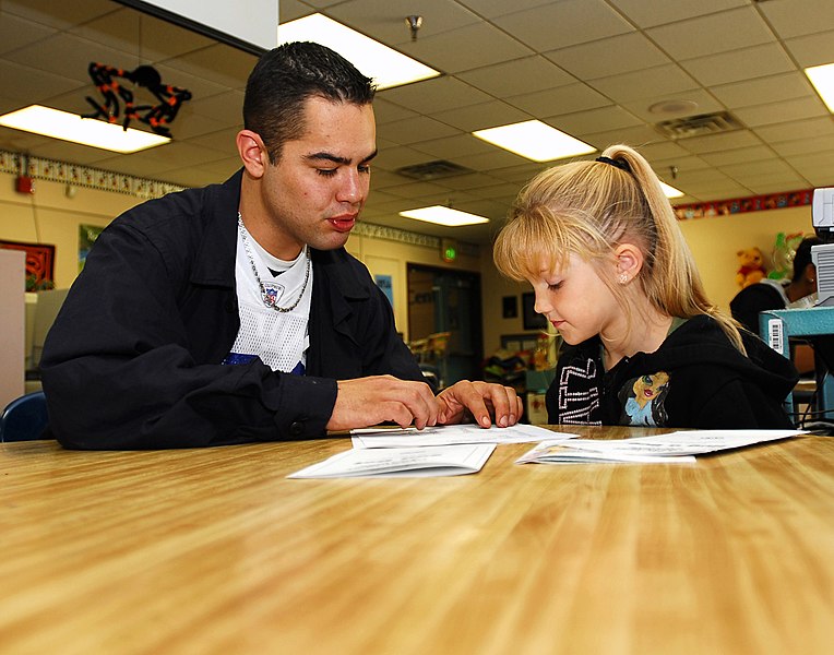 File:US Navy 071022-N-6538W-023 Machinist's Mate 3rd Class Joseph Herrera, tutors 1st graders at West Hills Elementary School.jpg