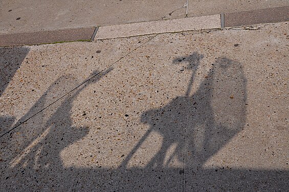 Shadow of bicyle with its basket