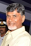 Vice Admiral Satish Soni presenting a memento to Andhra Pradesh CM Chandrababu Naidu, the Chief Guest on Navy Day 2014 cropped.jpg