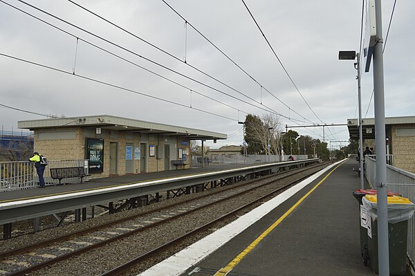 Southbound view from Platform 2 looking at station buildings, June 2014