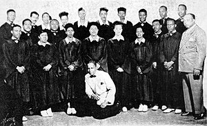 1949 publicity photo, taken after Glynn Settle (far right) replaced the entire roster after a walkout. Conductor Gilbert Allen is kneeling in the center front. WingsOverJordan-1949-choir.jpg