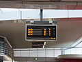 Information board listing the first four trains to leave Butler Station.