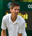 Yannick Mertens competing in the first round of the 2015 Wimbledon Qualifying Tournament at the Bank of England Sports Grounds in Roehampton, England. The winners of three rounds of competition qualify for the main draw of Wimbledon the following week.