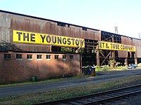 An abandoned facility of the Youngstown Sheet and Tube Company, owner of the Jeanette Blast Furnace. The Furnace is called "Jenny" in the 1995 Bruce Springsteen song "Youngstown", which is about the decline of Youngstown as an industrial city. Youngstown Sheet&Tube Abandoned.jpg