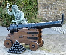 A sculpture in Whitehaven depicting an American sailor in the act of spiking a cannon 'Spiking The Guns' at Whitehaven. - panoramio.jpg