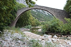 Arch bridge crossing Portaikos river