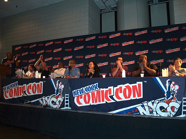 The "Return to the Dakota Universe" panel at the 2017 New York Comic Con. From left to right: DC Vice President of Creative Affairs Dan Evans (at the 