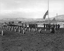 Marines of the 1st Marine Division pay their respects to fallen marines during memorial services at the division's cemetery at Hamhung, Korea, following the break-out from Chosin Reservoir, 13 December 1950 1st Marine Division Cemetery, Hamhung, Korea, 13 December 1950 (6185260597).jpg