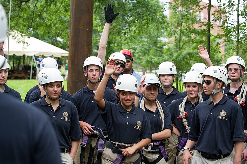 File:2015 Law Enforcement Explorers Conference explorers raise their hands during pulley exercise.jpg