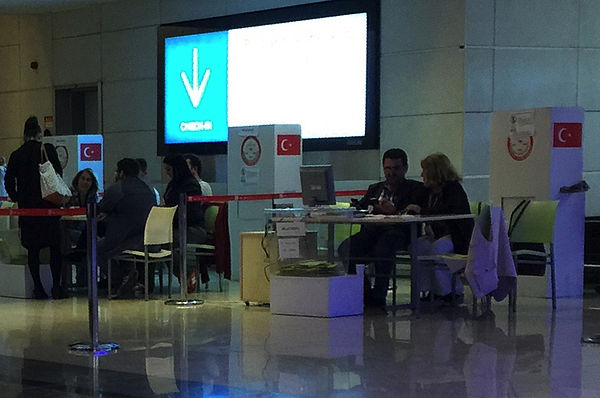Citizens voting at customs in Sabiha Gökçen International Airport for the general election in Istanbul, 7 June 2015