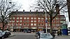 Woonhuizen-winkels in verstrakte Amsterdamse School-stijl
