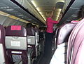A Wizz Air Airbus A320 típusú repülőgépének fedélzete légiutas-kísérővel.JPG