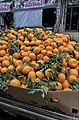 A wooden cart full of mandrine with it’s perfect orange color and green leaves in Boulaq a local neighbourhood in Giza, Egypt.jpg