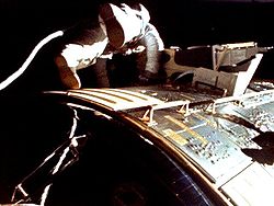 Al Worden during his EVA to retrieve film from cameras in the SIM bay. This is a frame from the a 16 mm film shot by Jim Irwin from the hatch. Apollo 15 Al Worden during EVA.jpg