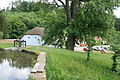 Čeština: Porčův mlýn na řece Býkovce v obci Býkovice, okres Blansko. Pohled ze severozápadu od mlýnského náhonu. English: Porč water-mill in Býkovice, Blansko District.