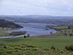 Castle Semple Loch from Kenmure Hill with the site of the Peel Tower in the middle distance. Castle Semple Loch from Kenmure Hill, Lochwinnoch.jpg