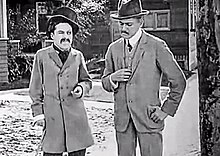 Charlie Chaplin (left) in Making a Living 1914.jpg