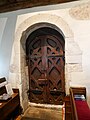 Door in the nave of the medieval Church of Saint Nicholas, Pyrford. [41]