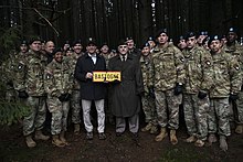 Milley, Defense Secretary Mark Esper, and members of the 101st Airborne Division tour the Bois Jacques during the 75th anniversary of the Battle of the Bulge, December 2019. Esper Tours WWII Bois Jacques Foxhole Site in Belgium.jpg