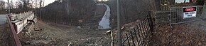 Panoramic view of Fern Hollow from the east end (Feb 27, 2022). By this time, all broken bridge structures had been removed. Fern Hollow Bridge in Reconstruction.jpg