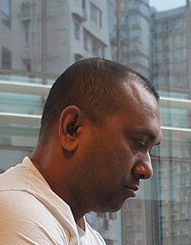 A serious-looking Firoz Mahmud in profile