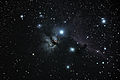 Flame and Horsehead Nebulas in Orion (also a satellite).jpg