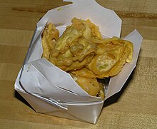 Carryout Chinese food is commonly served in a paper carton with a wire bail, known as an oyster pail. FriedWonton.jpg