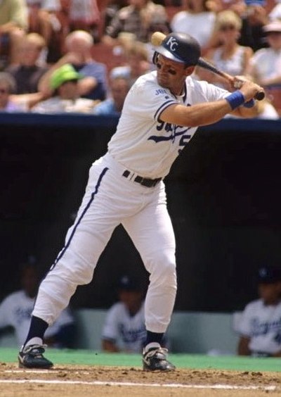 George Brett bats during a 1990 game at Kauffman Stadium (then Royals Stadium)