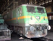 Dual coupling on a modern locomotive. (Indian locomotive class WAG-9) The chain is mounted on a hinge on the right of the AAR coupler