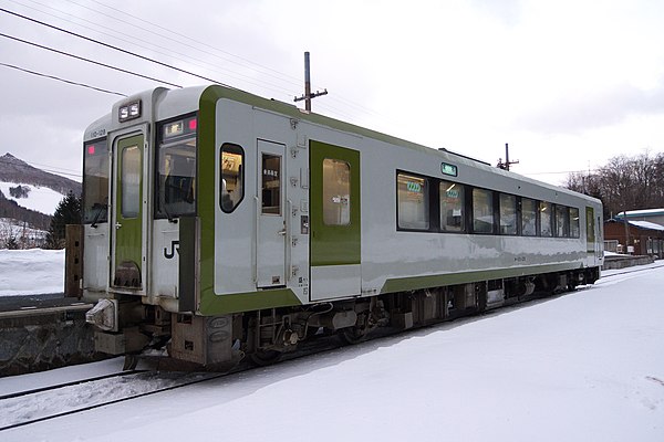 A KiHa 110 series DMU car on the Yamada Line in March 2012