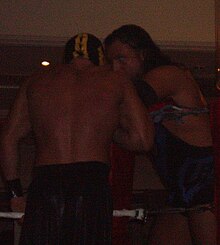 Legend (right) at a wrestling live event in Arklow, Ireland in 2008 Joe E. Legend and Mistico Del Reyo.jpg