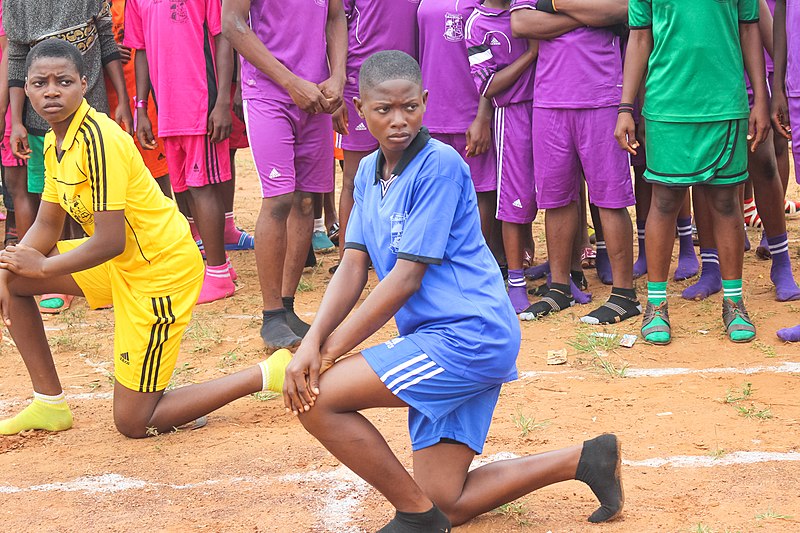 File:Junior female student athletes as they prepare for a 200 meters race.jpg