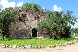 The remaining walls of the Kussen village church in 2016