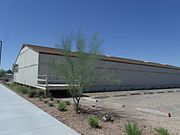 Housing Storage Supply Warehouse at Williams Air Force Base (now Arizona State University at the Polytechnic campus), constructed in December 1941 by the Del E. Webb Construction Company. The warehouse is significant for its association with the construction of Williams Air Force Base on the land on which Phoenix–Mesa Gateway Airport and the Arizona State University at the Polytechnic campus are now located. Listed in the National Register of Historic Places – 1995. Reference 95000746.