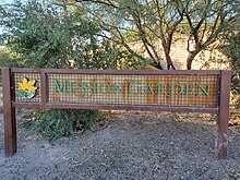 Sign welcoming visitors to Mission Garden
