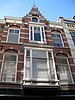 Pand in Amsterdamse School, Neo-Renaissance stijl