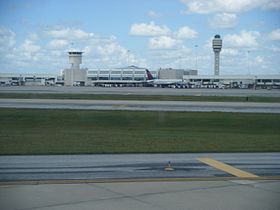 Orlando International Airport terminal from arriving airplane.jpg