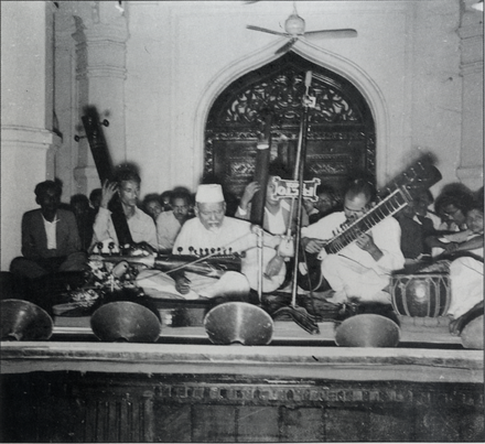 Ustad Alauddin Khan (centre), one of the greatest maestros of South Asian classical music, performing with his ensemble at Curzon Hall in Dhaka, 1955