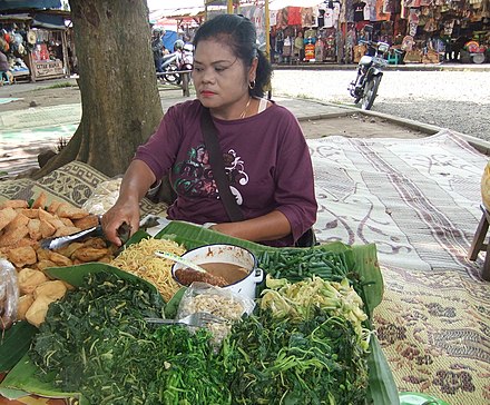 Displaying vegetables and other ingredients on banana leaf is a traditional way on selling pecel near Borobudur, Central Java.