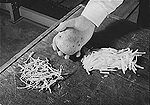 A whole potato, sliced pieces (right), and dried sliced pieces (left), 1943 Potato - dehydrated and sliced.jpg