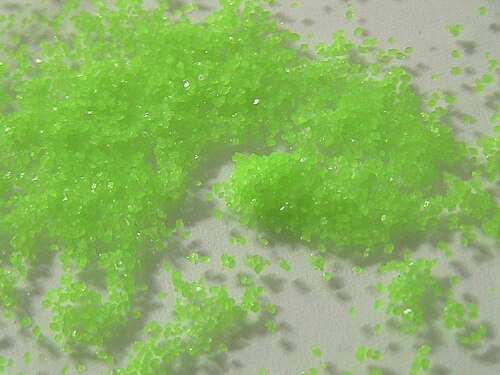 bright, light green praseodymium sulfate crystals