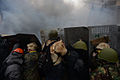 Protesters holding protective positions. Clashes in Ukraine, Kyiv. Events of February 19, 2014