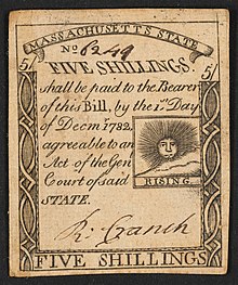 A 1779 five-shilling note issued by Massachusetts with the inscription: "FIVE SHILLINGS. shall be paid to the Bearer of this Bill, by the 1st Day of Decmr. 1782 agreeable to an Act of the Genl, Court of said STATE." ; Within print of sun: "RISING".
