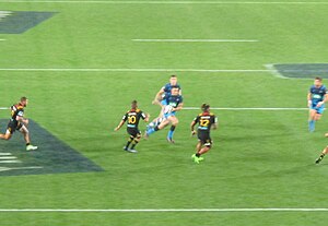 Sonny Bill Williams on the run against the Chiefs, 26 May 2017 SBW chiefs blues.jpg