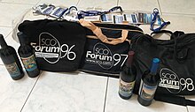 Badges, bags, and wine from over the years at SCO Forum SCO Forum badges bags and wine.jpg