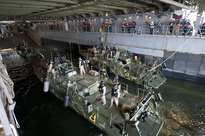 File:Sailors moor a Riverine patrol boat and Riverine command boats in the well deck of USS Oak Hill.jpg