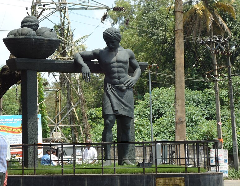 File:Statue of a farmer at Athani Junction.JPG