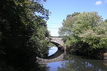 The Stone Arch Bridge in Uxbridge, Massachusetts Stone Arch Bridge on Hartford Ave, Uxbridge MA.jpg