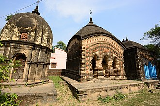 The three temples of Ghosalpara at Patrasayer in Bankura district of West Bengal. The temple on the left is a pancharatna deal Shiva Temple; the middle one is a charchala Raghuvir Temple while the temple on the extreme right is a dalan temple dedicated to Goddess Kali. All the temples are built of laterite. Temples of Ghosalpara-Patrasayer-West Bengal-DSC 0021.jpg