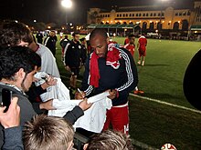 Thierry Henry signing autographs in 2014 Thierry Henry signing autographs.jpg
